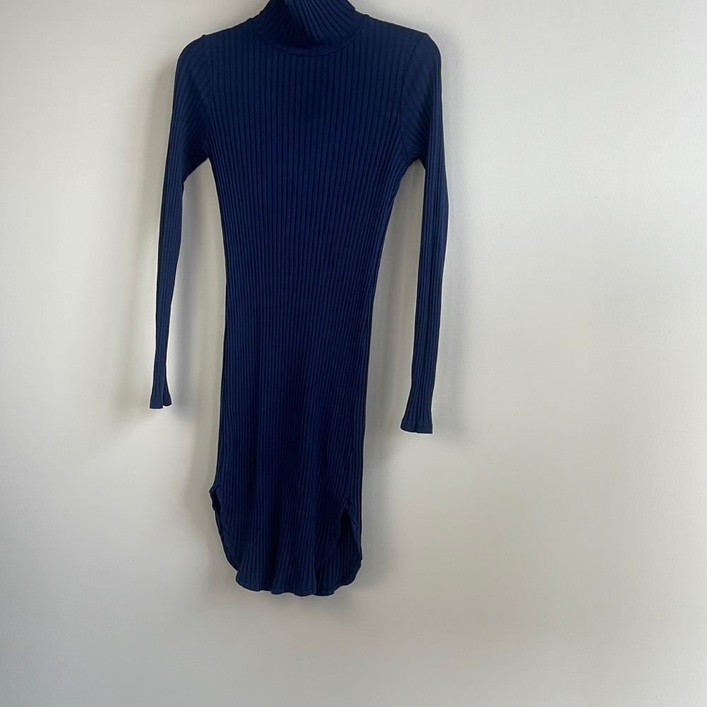 Navy blue king sleeve form fitting dress with slits up the sides